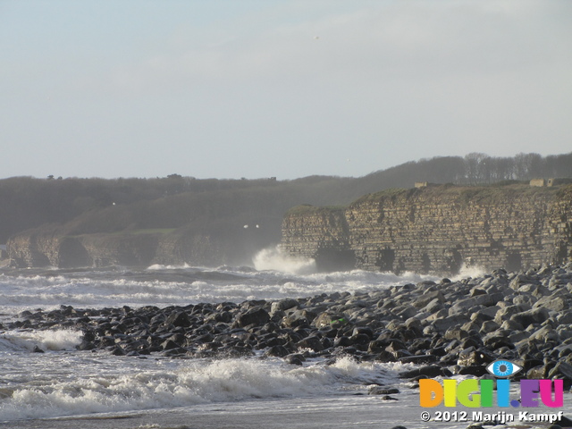 SX21203 Waves crashing at cliffs by Llantwit Major beach